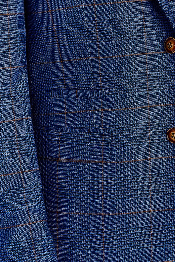 Close-up of Alex navy burgundy check three piece suit fabric showing pattern and stitching.
