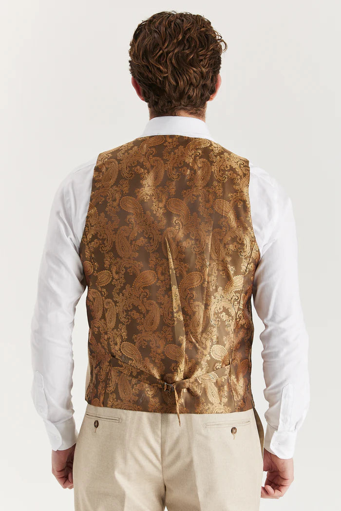 Rear view of the beige waistcoat showing adjustable strap and elegant paisley satin back in light brown.