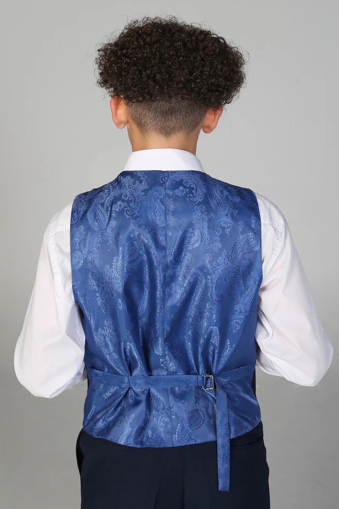 Rear view of navy waistcoat with blue paisley satin back and adjustable strap over white shirt.