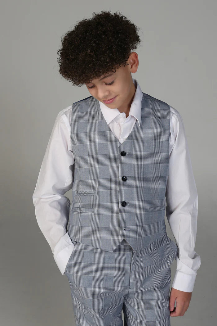 Boy in matching sky blue check waistcoat and trousers, styled with a crisp white dress shirt.