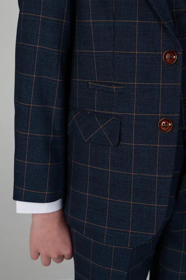 Detail view of navy windowpane suit jacket pocket with flap design and precise stitching on formal boys blazer.