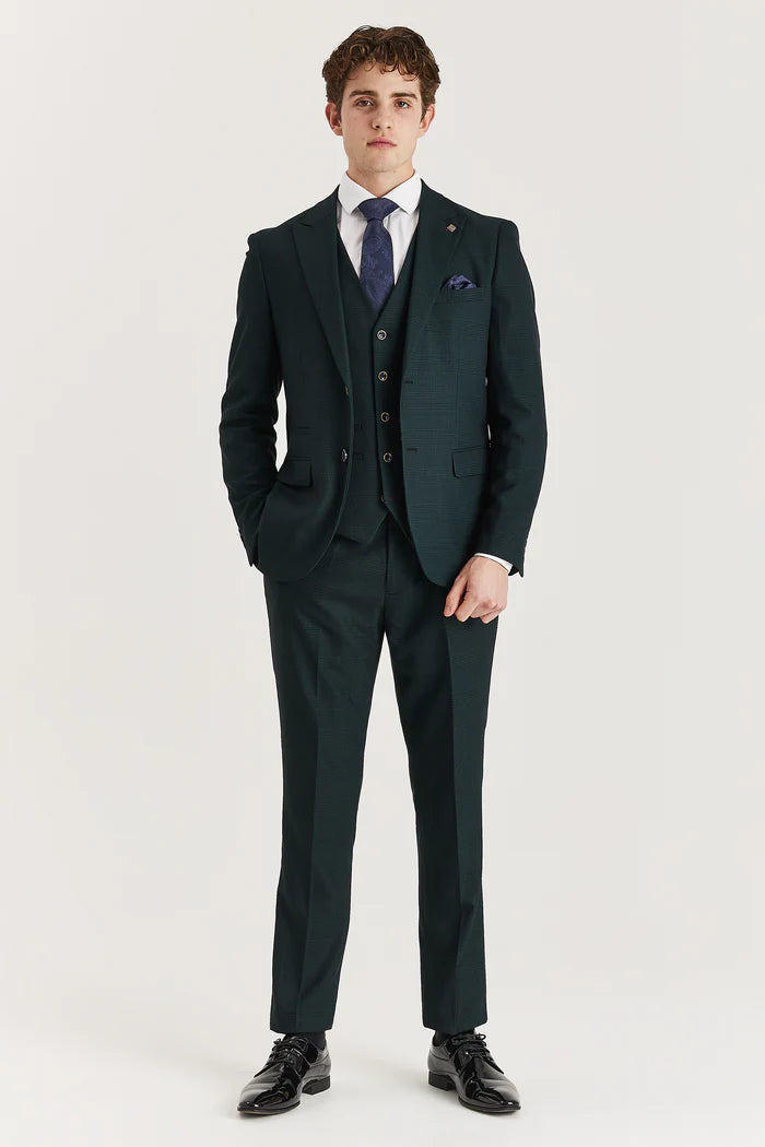 Full front view of a man wearing a tailored green check three-piece suit with black dress shoes and a white shirt.