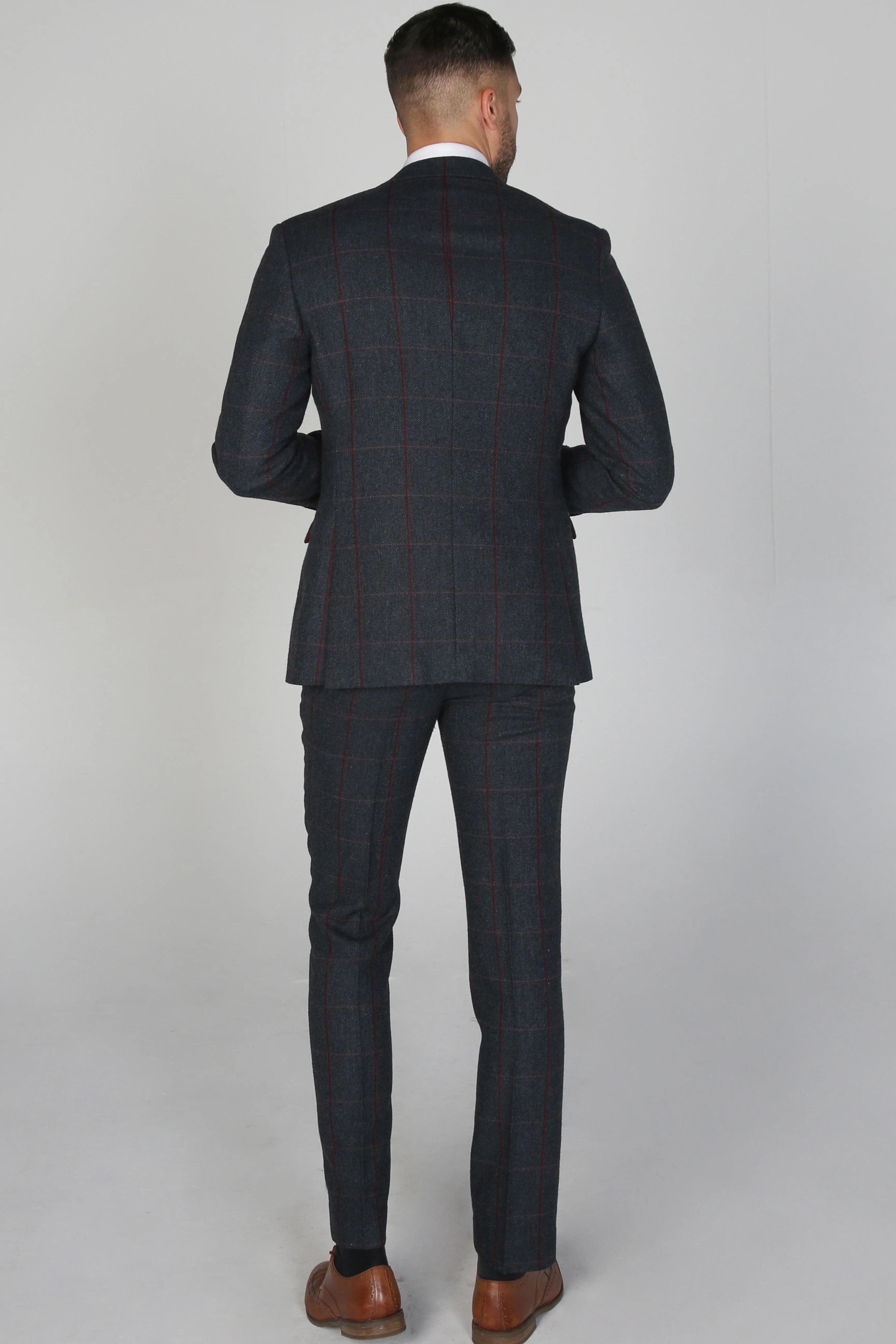 Back view of the Madrid Men's Navy Tweed Checkered Three Piece Suit emphasizing the clean lines and detailed stitching.