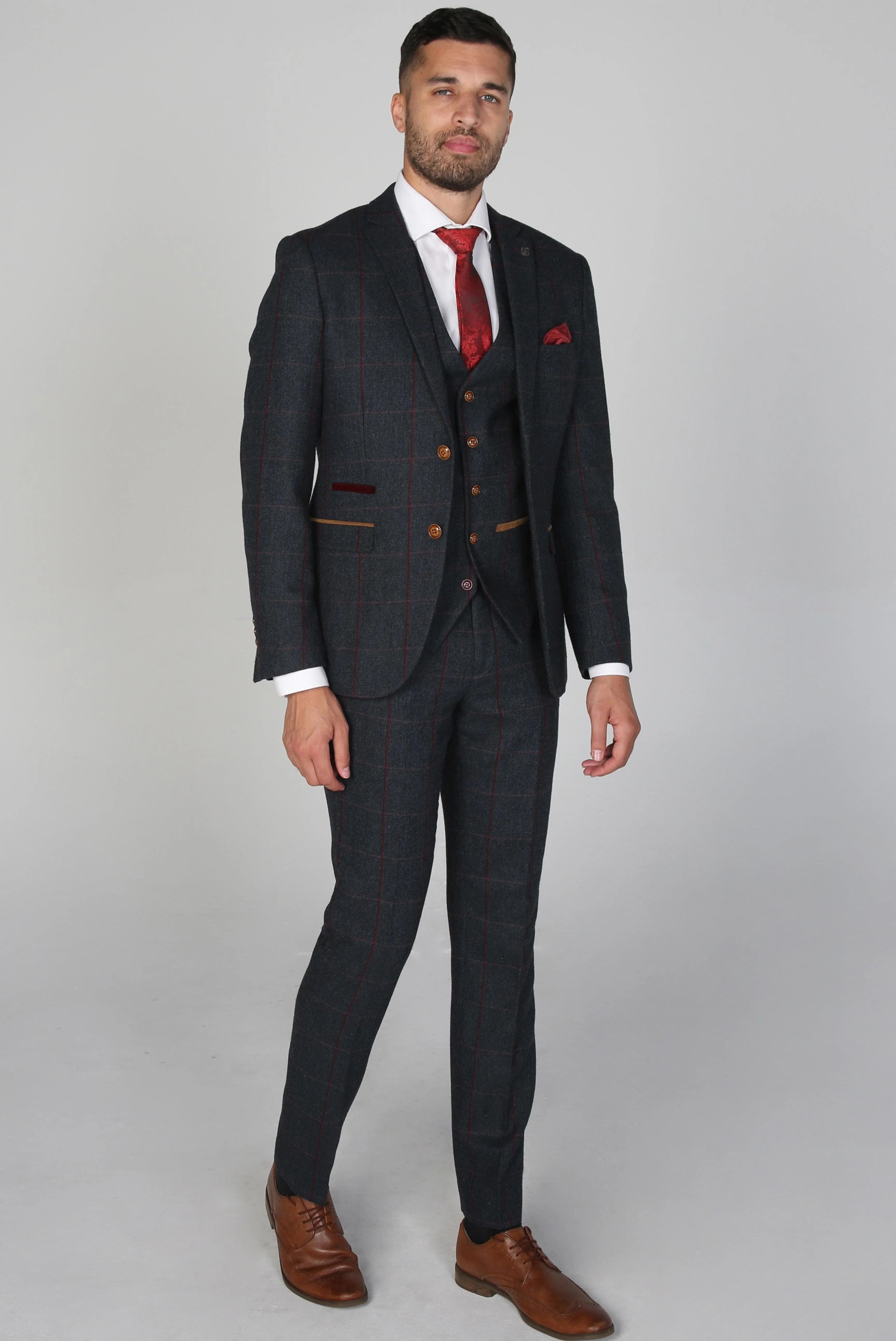 Full body view of the Madrid Men's Navy Tweed Checkered Three Piece Suit highlighting the sleek design with brown shoes.