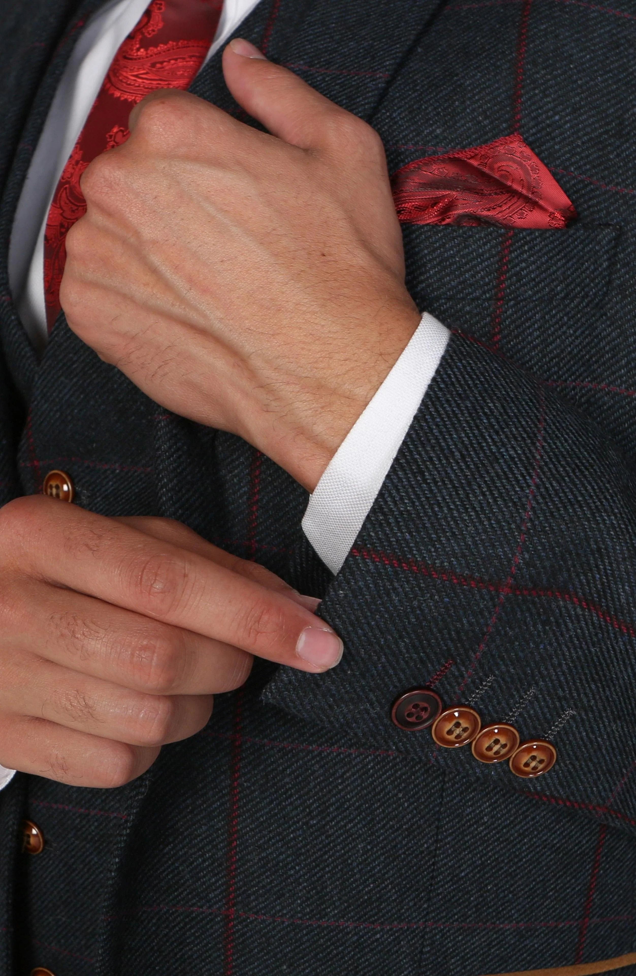 Close-up of the sleeve buttons on the Madrid Men's Navy Tweed Checkered Three Piece Suit, showing the quality and design.