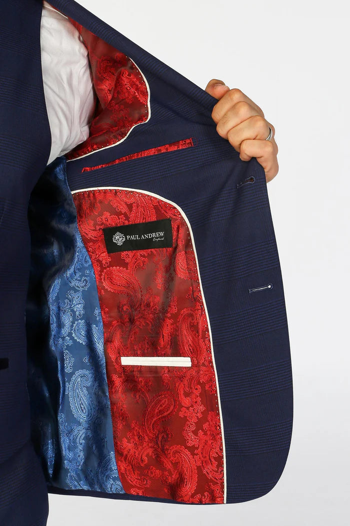 Inside view of the Mark blue blazer showcasing luxurious red and blue paisley satin lining with Paul Andrew branding.