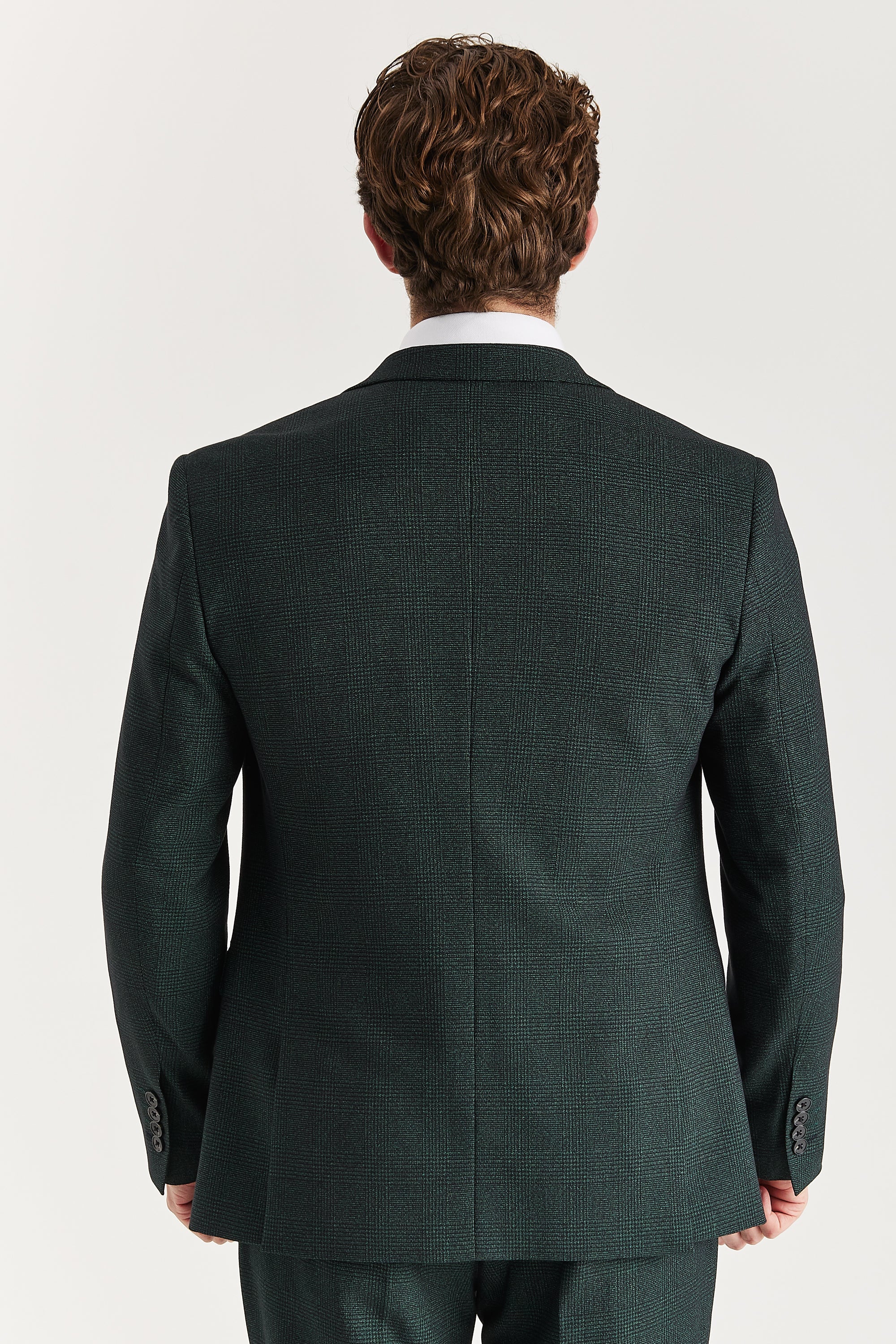Rear view of the olive check blazer with a ventless back, central back seam and dark black sleeve buttons.