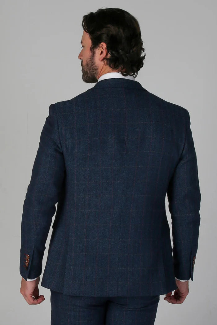 Rear view of the navy tweed suit blazer showing subtle check pattern and structured fit.
