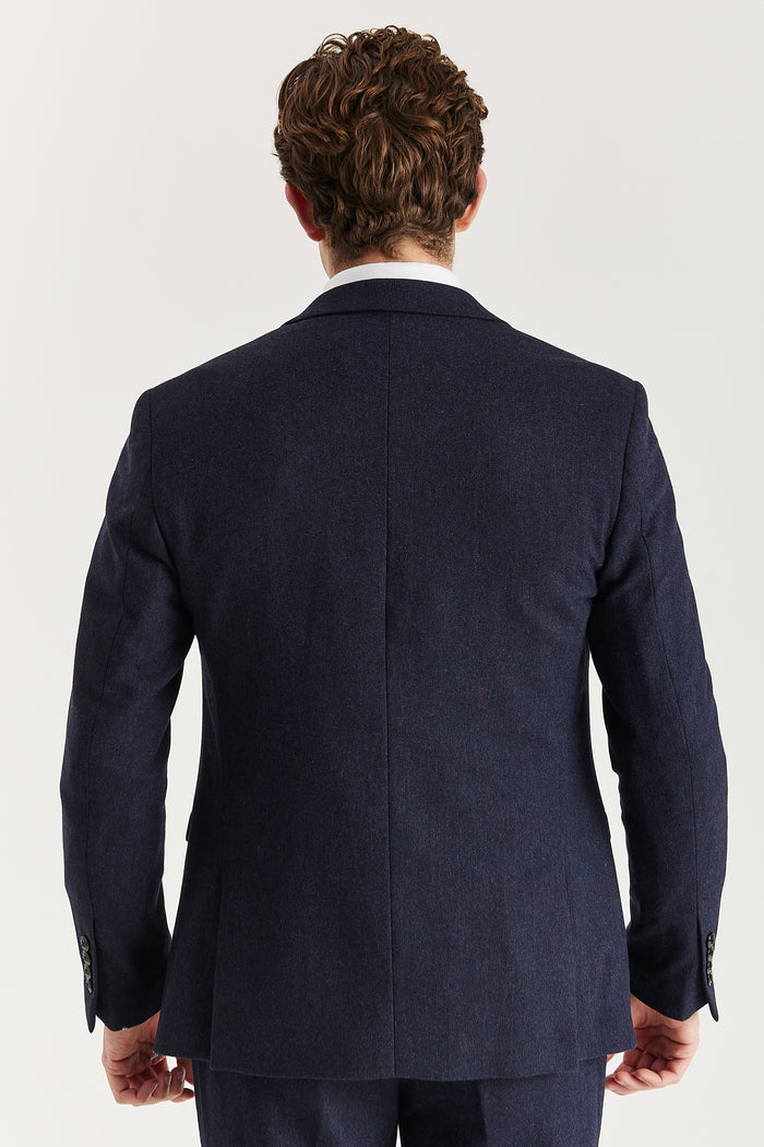 Back view of Oscar navy tweed three-piece suit jacket showing clean seam work and classic fit.