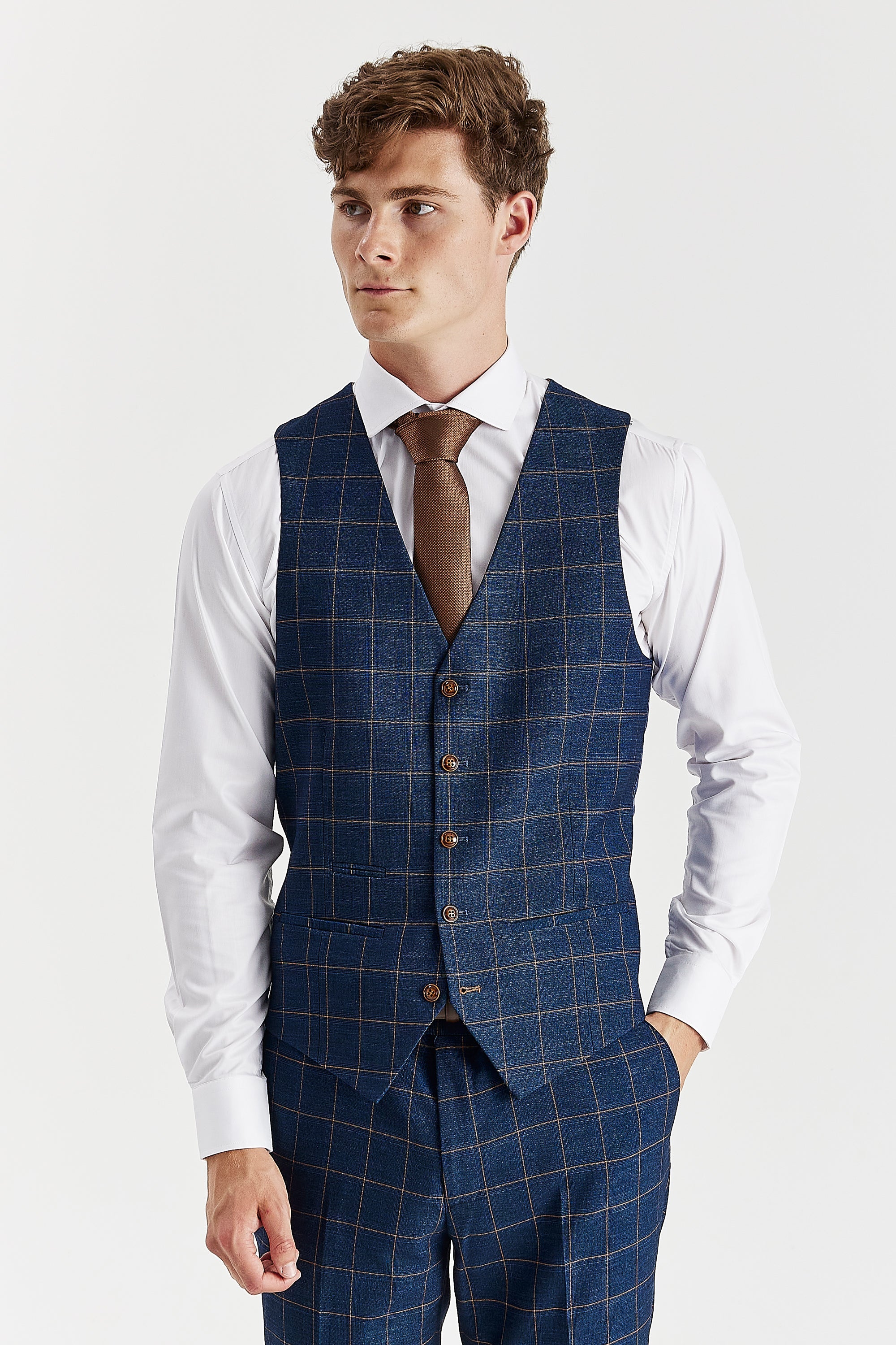 Front view of a navy waistcoat with a brown windowpane check pattern, matching trousers, a white shirt and a brown tie.
