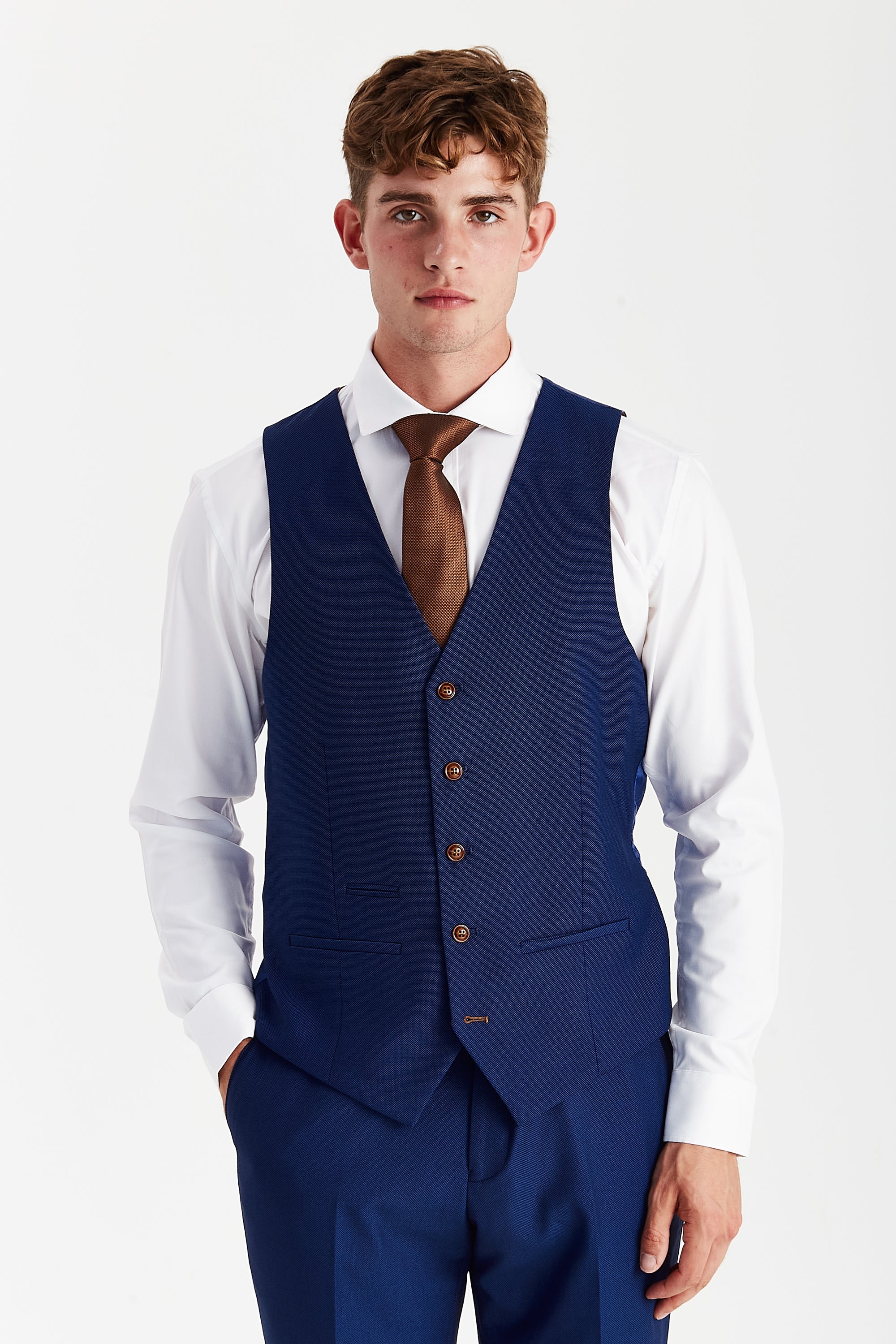 Front view of a blue textured waistcoat with brown buttons, matching trousers, white shirt and brown tie.