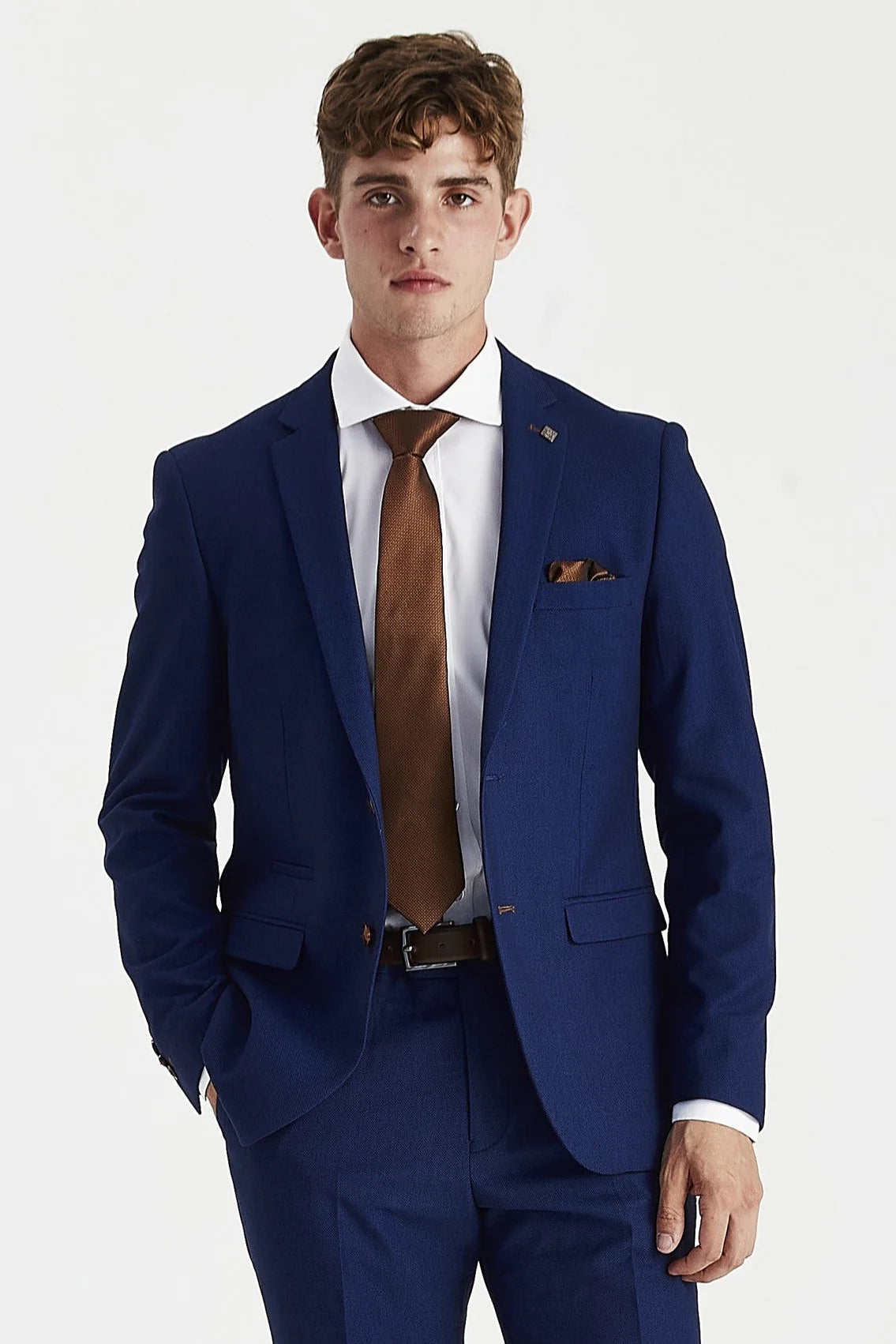 Front view of the blue textured blazer, worn with matching trousers, a white shirt, brown tie and matching pocket square.