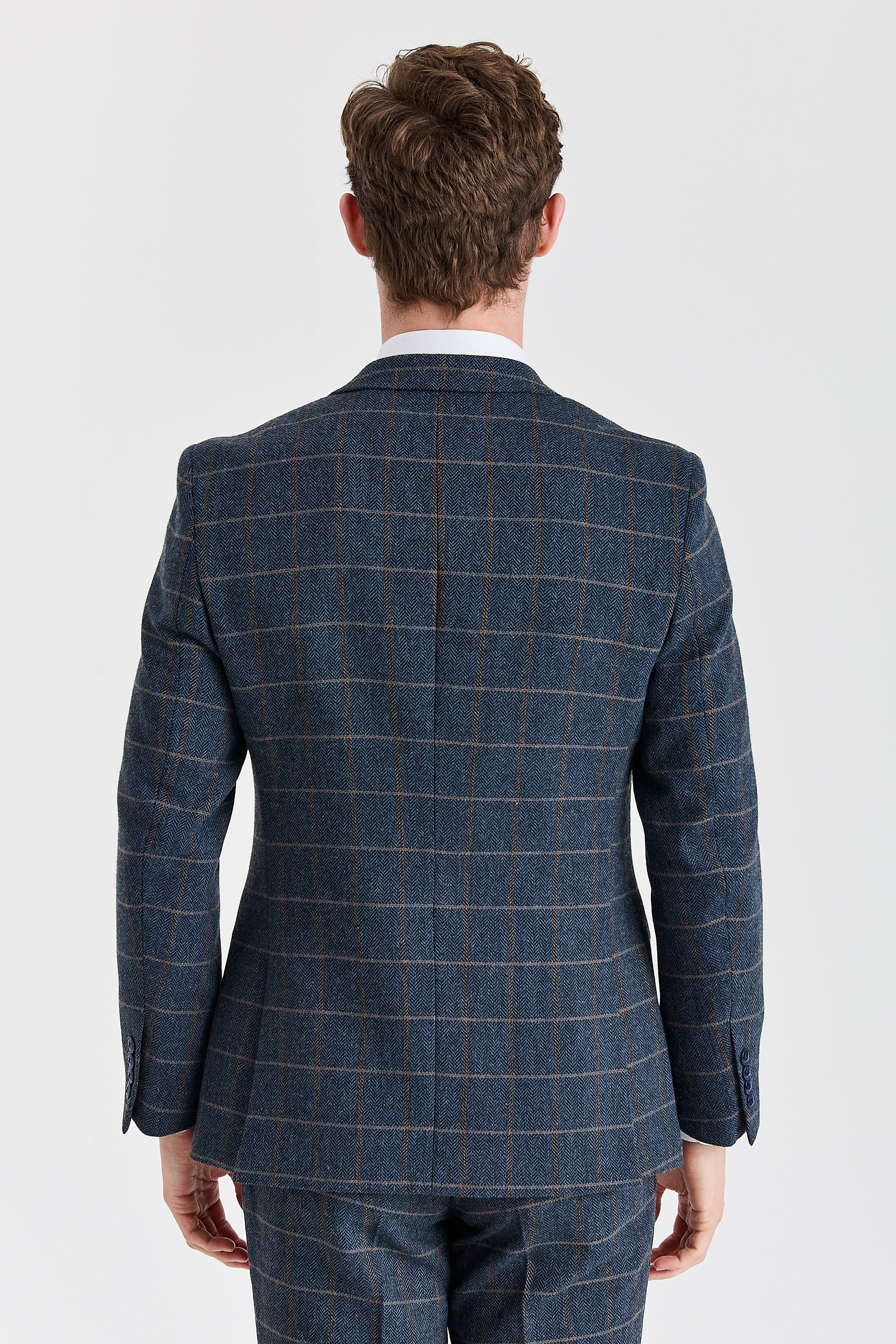 Navy herringbone tweed check blazer shown from the rear.