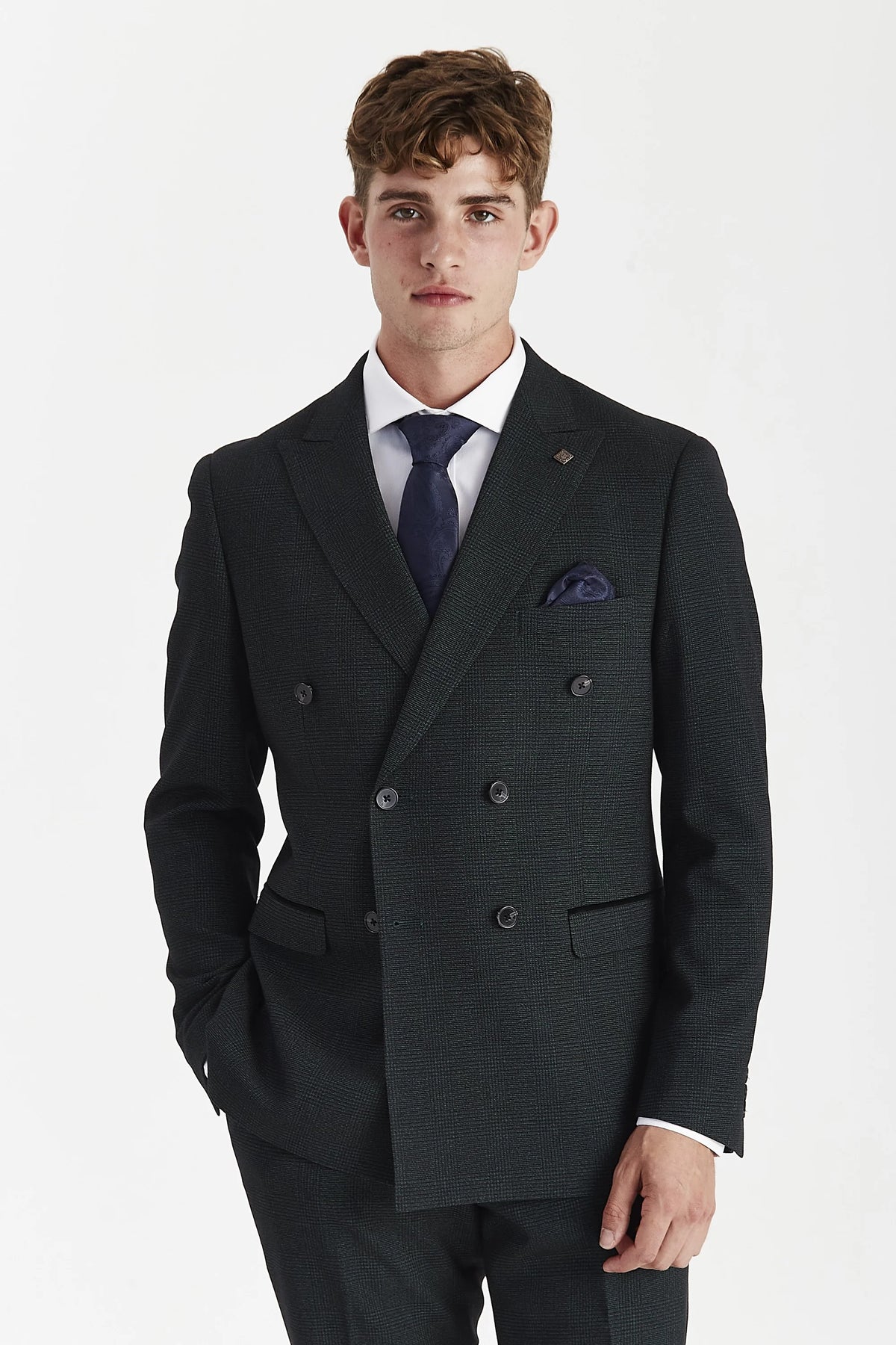 Olive check double-breasted jacket on a model, with peak lapels, two rows of dark buttons and flap pockets.