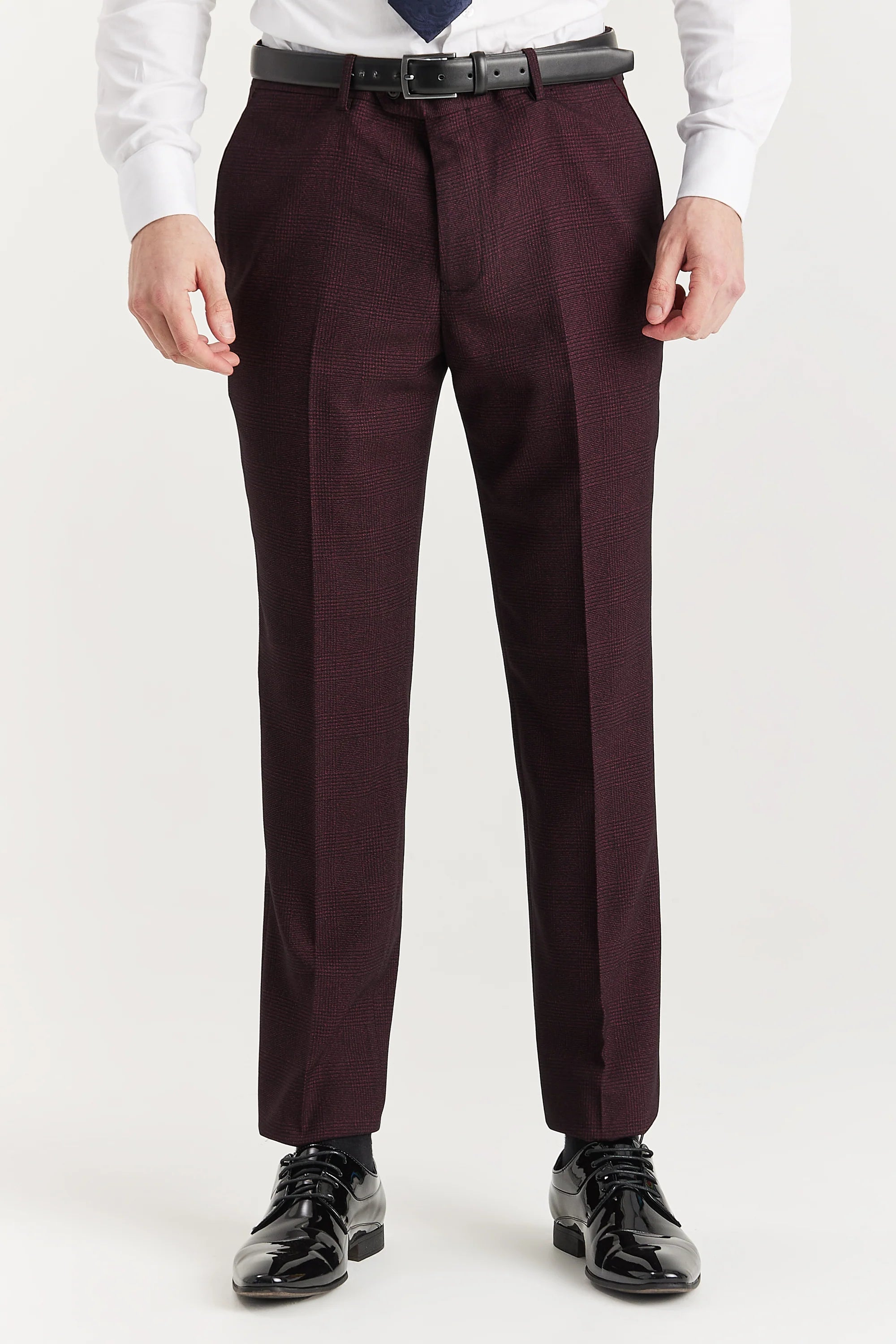 Men’s wine check trousers shown from the front, worn with a white shirt, blue tie and black formal shoes.