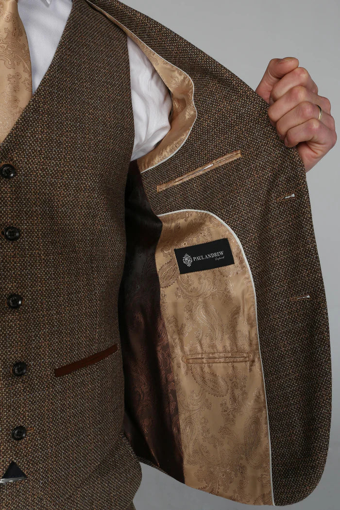 Interior lining of Ralph brown tweed blazer with light gold brown paisley pattern
