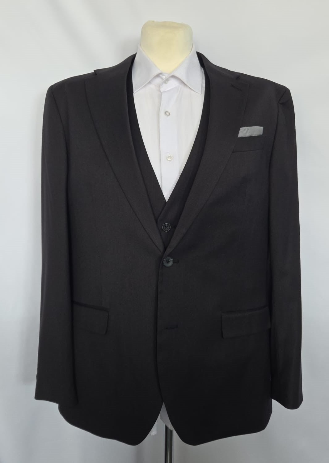 Clean front view of Thomas Goodwin black jacket layered over matching waistcoat, notch lapel.