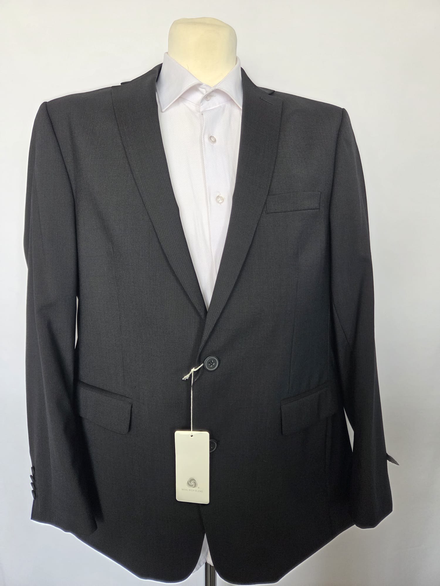 Front view of Thomas Goodwin black wool-blend two-piece suit jacket with notched lapel and two-button closure, modern fit.