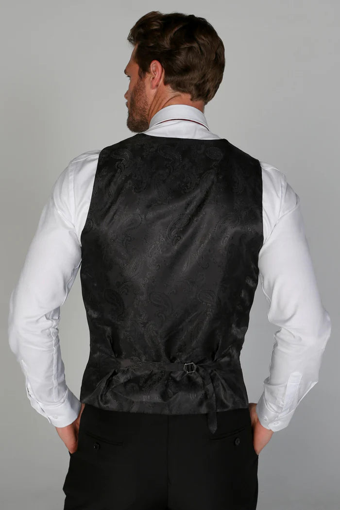 Rear view of the Harry Black tuxedo vest with an adjustable strap and paisley-patterned fabric.