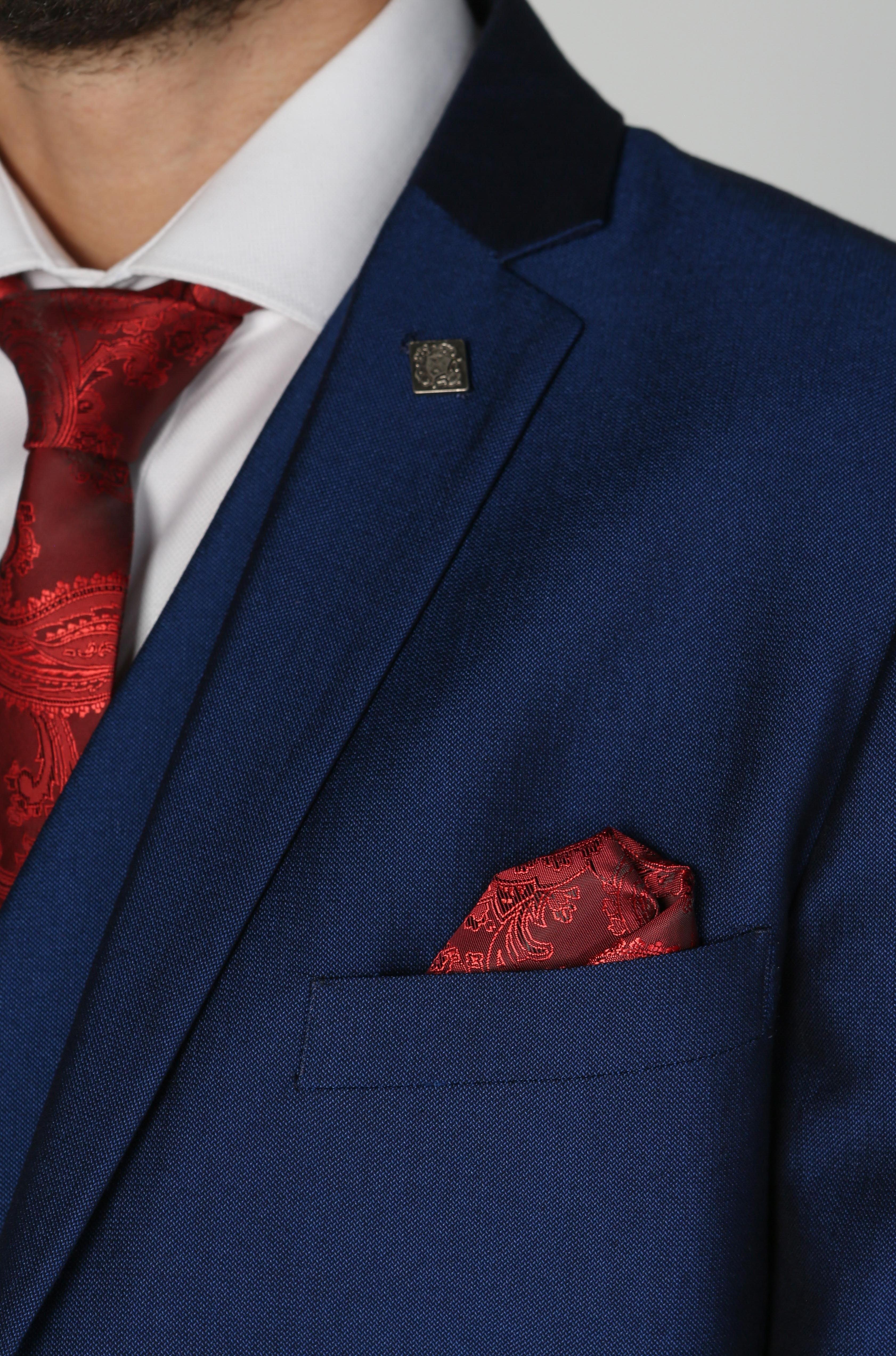 Close-up of Kingsley Blue Men's three-piece suit, highlighting the red tie and pocket square.