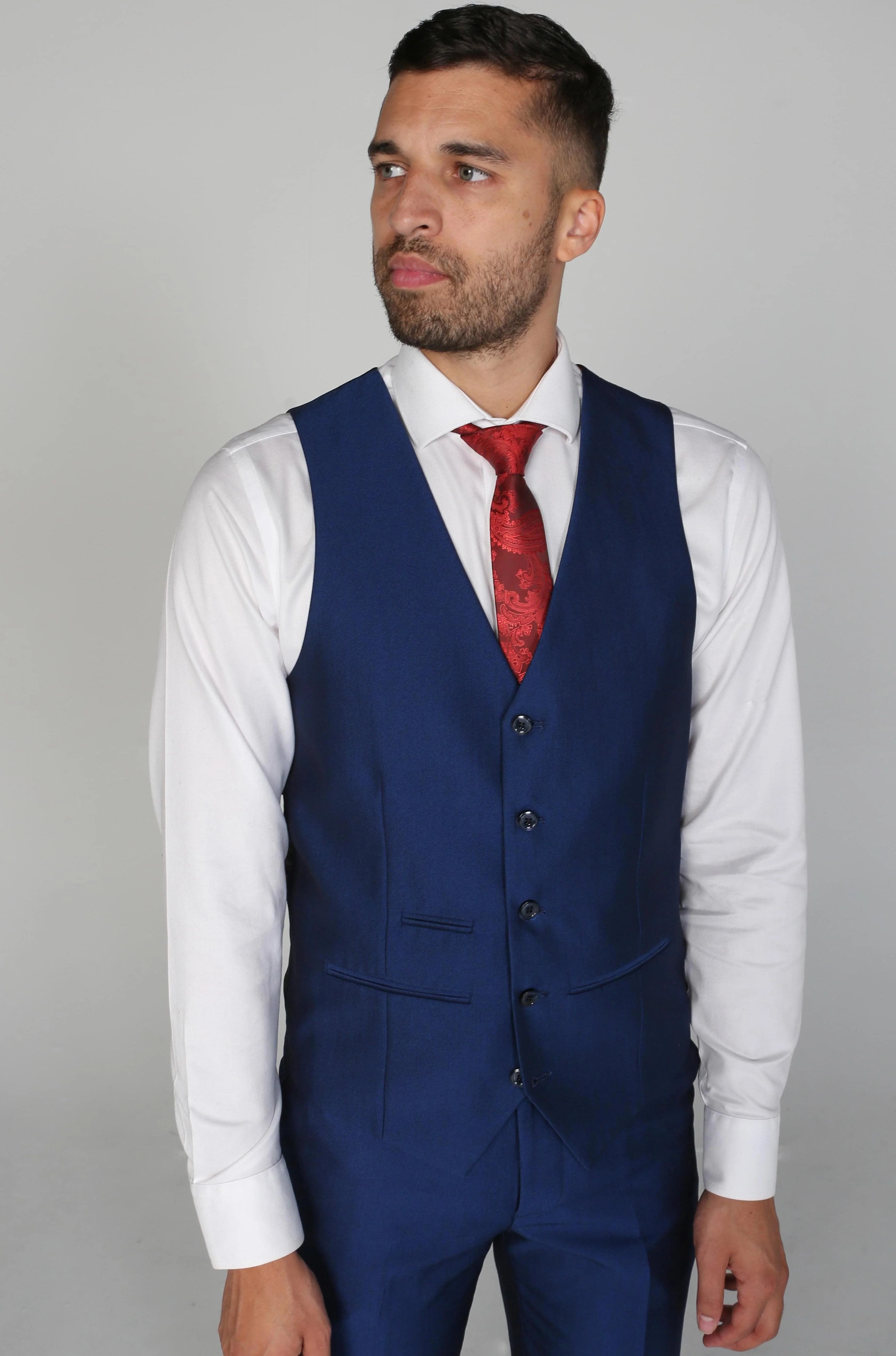 Close-up of Kingsley Blue Men's three-piece suit waistcoat with white dress shirt and red tie.
