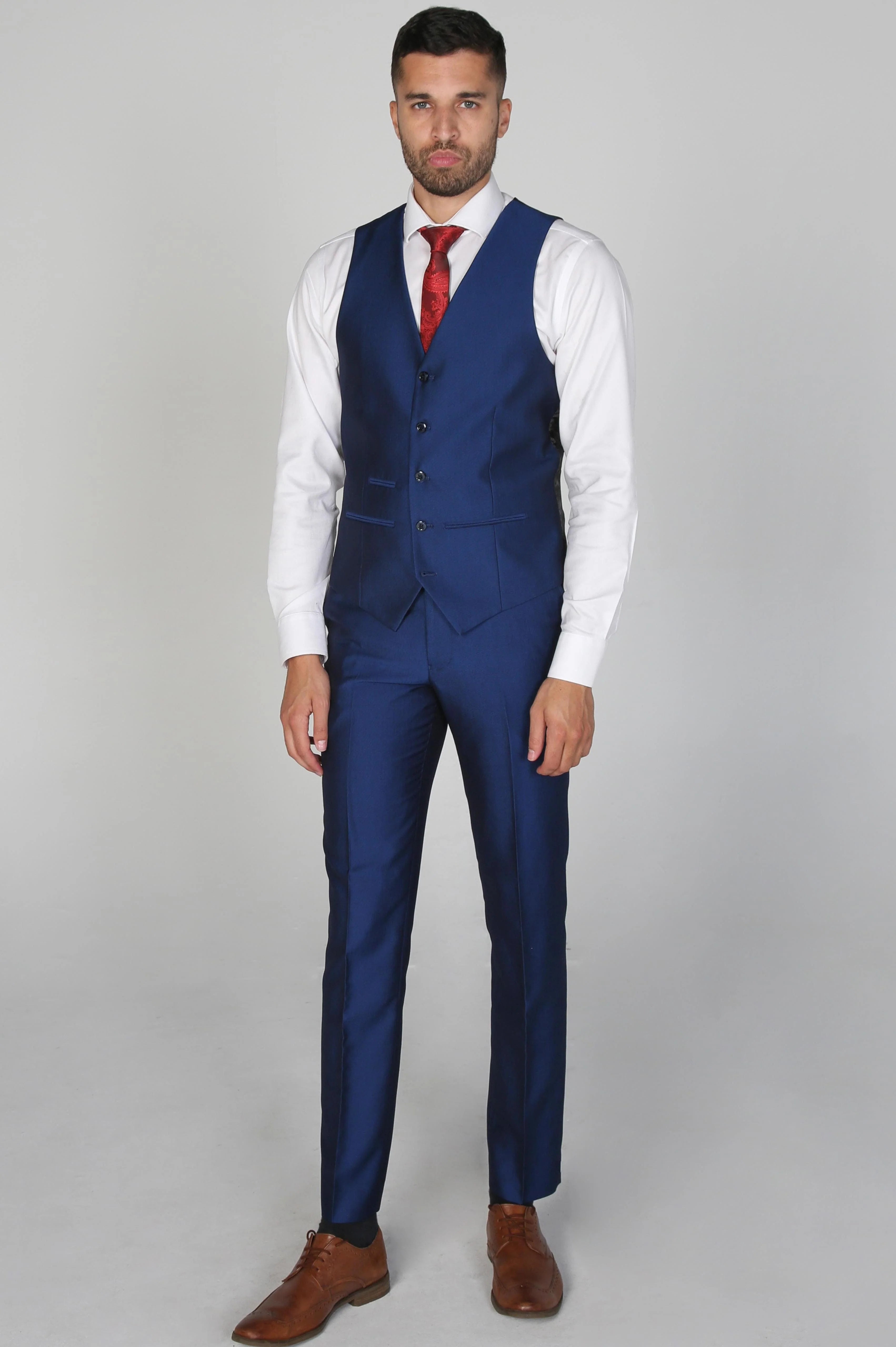 Kingsley Blue Men's three-piece suit waistcoat with white dress shirt and red tie, model standing.