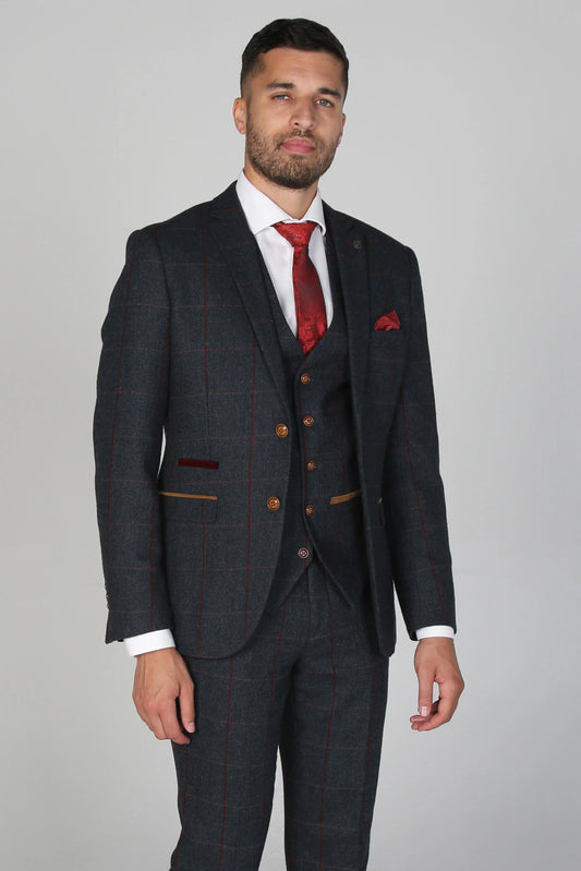 Front view of the Madrid Men's Navy Tweed Checkered Three Piece Suit with red tie, pocket square, and waistcoat.