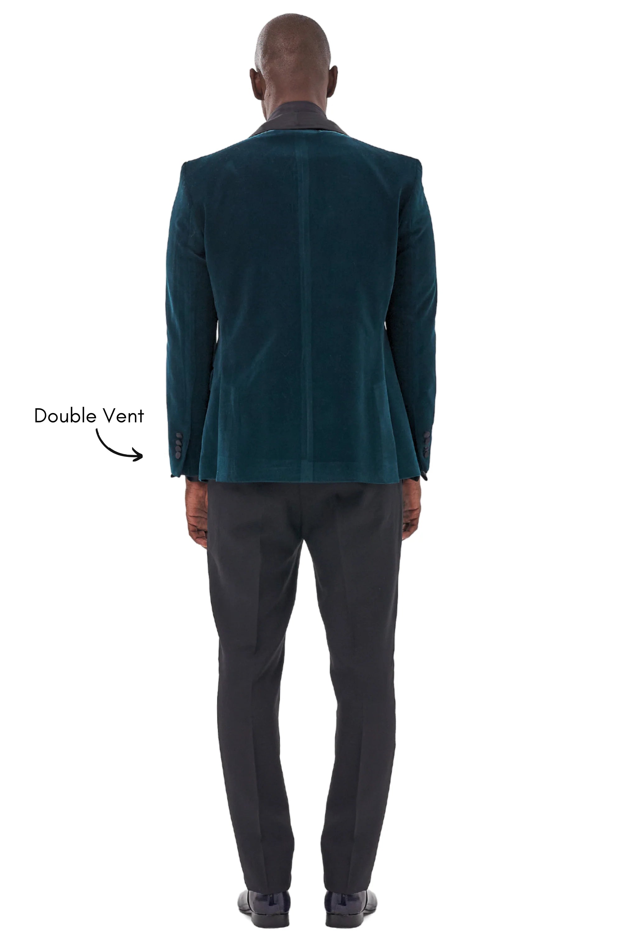 Back view of emerald green velvet dinner jacket with double vents