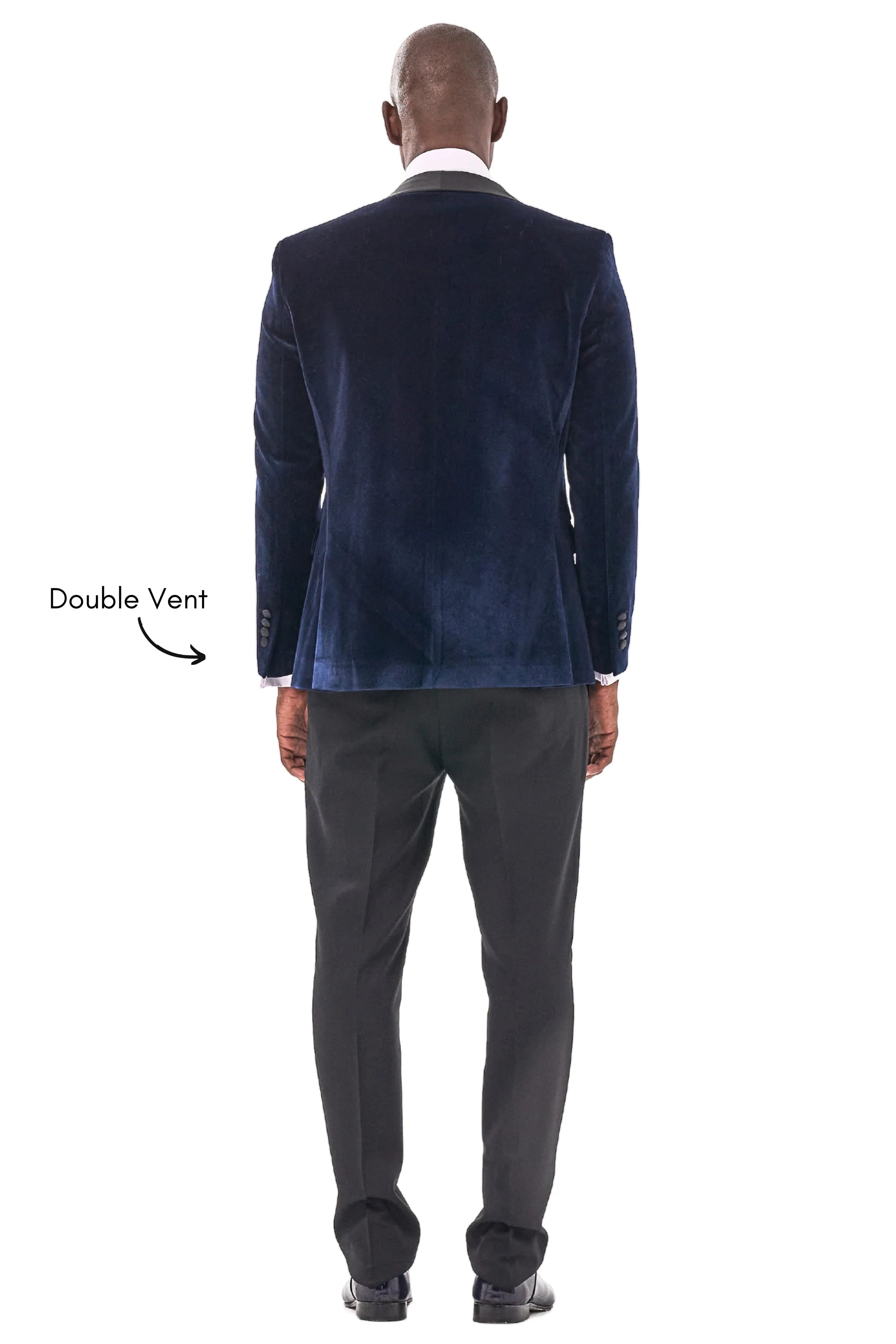 Back view of midnight blue velvet dinner jacket with black satin collar and double vents