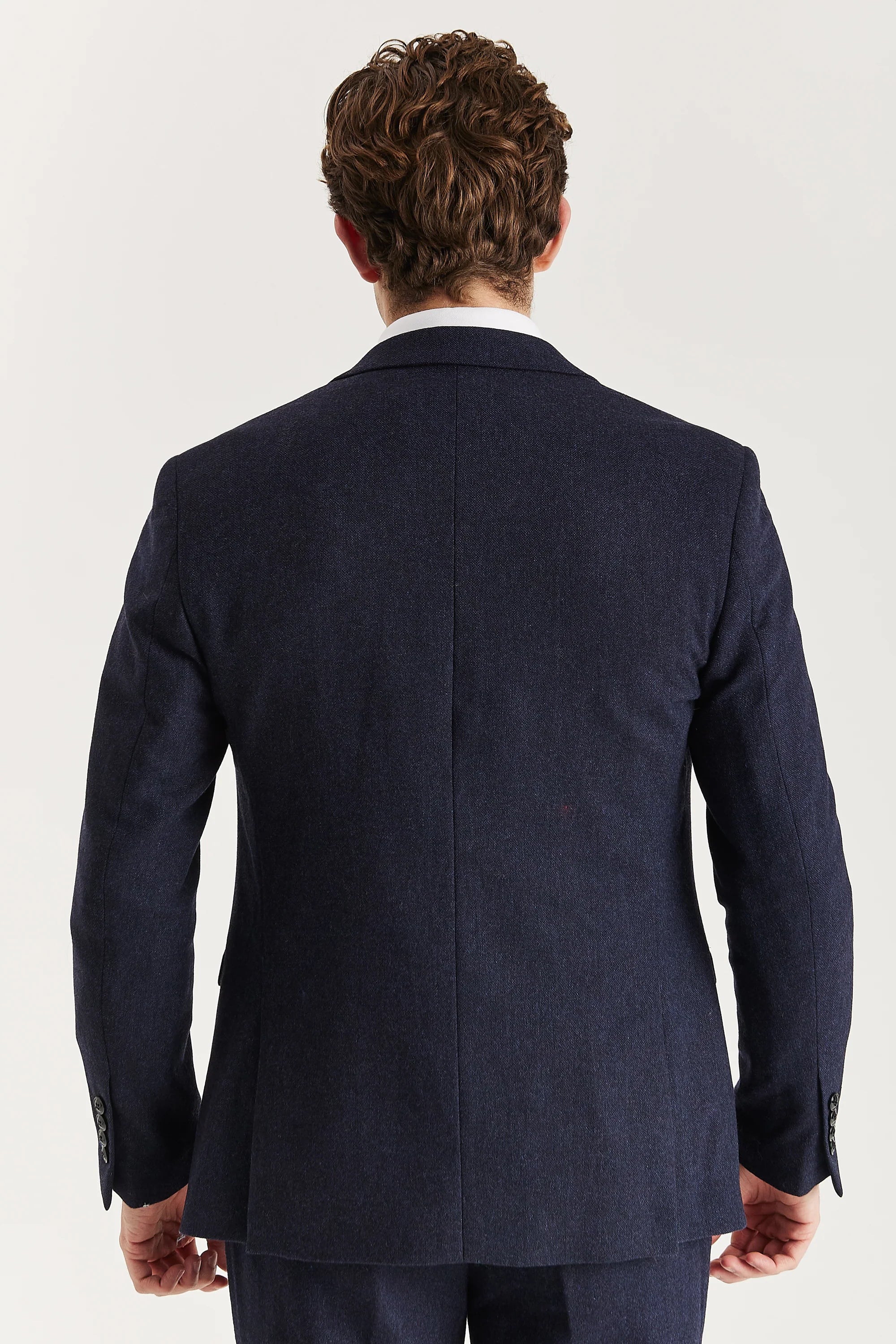 Rear view of the navy tweed blazer