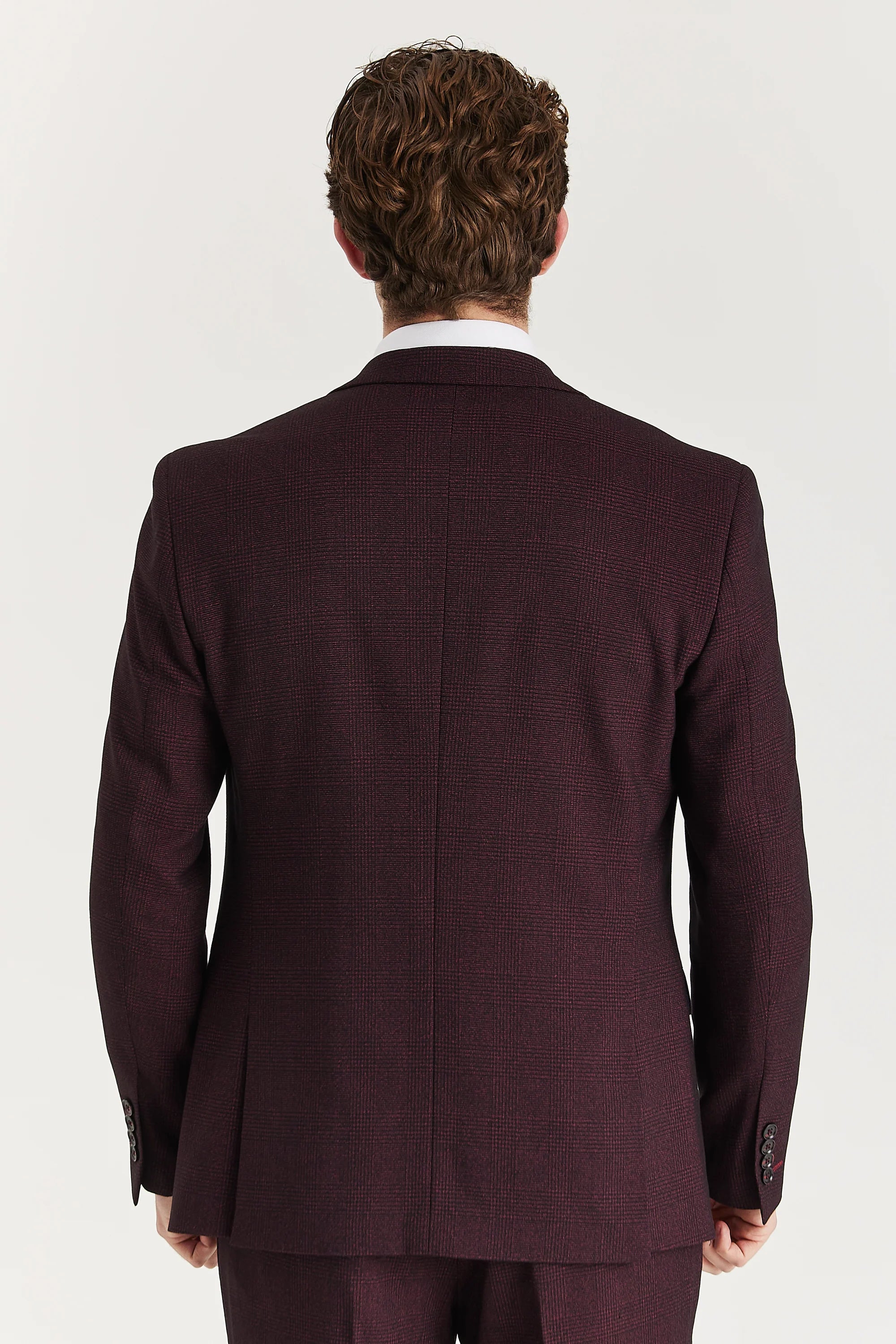 Rear view of the wine check blazer with a ventless back, central back seam and black sleeve buttons.