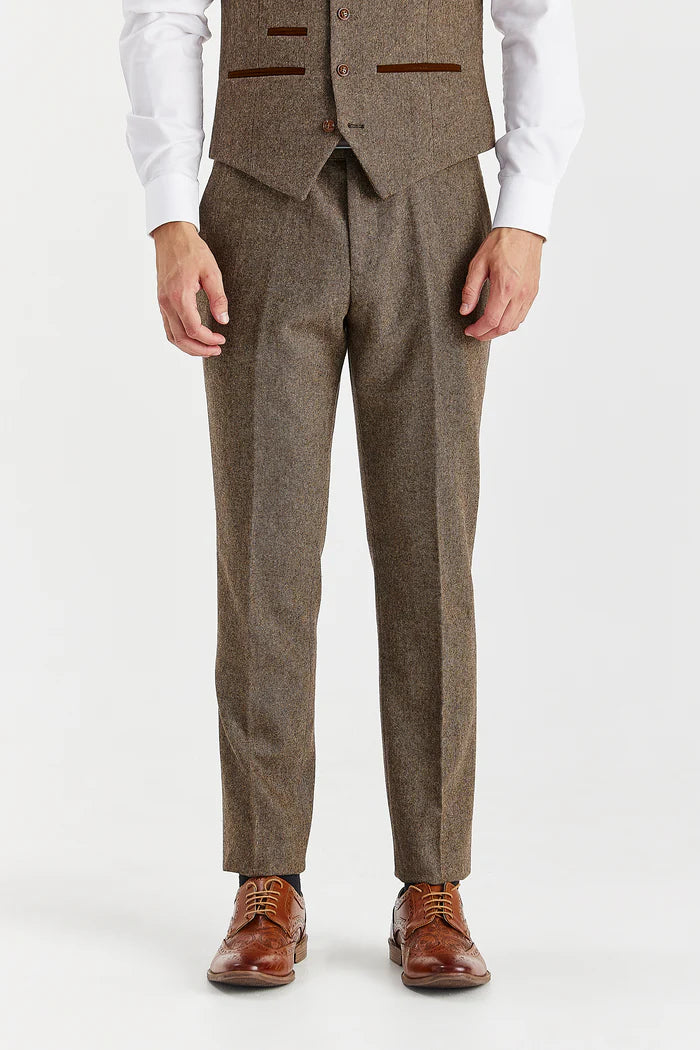 Front view of Oscar brown tweed trousers with slim tailored fit, worn with matching waistcoat and brown brogues.