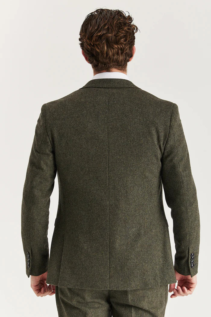 Back view of Oscar green tweed three-piece suit jacket showing structured tailoring and clean seam finish.


