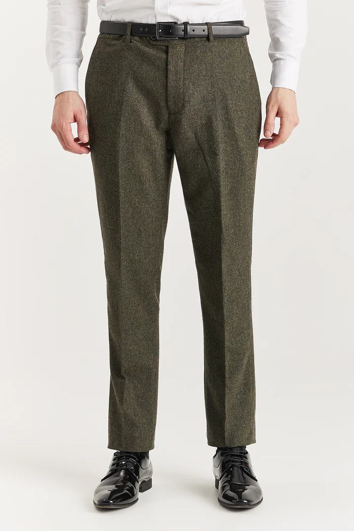 Front view of Oscar green tweed trousers with slim tailored fit, paired with black belt and polished black dress shoes.

