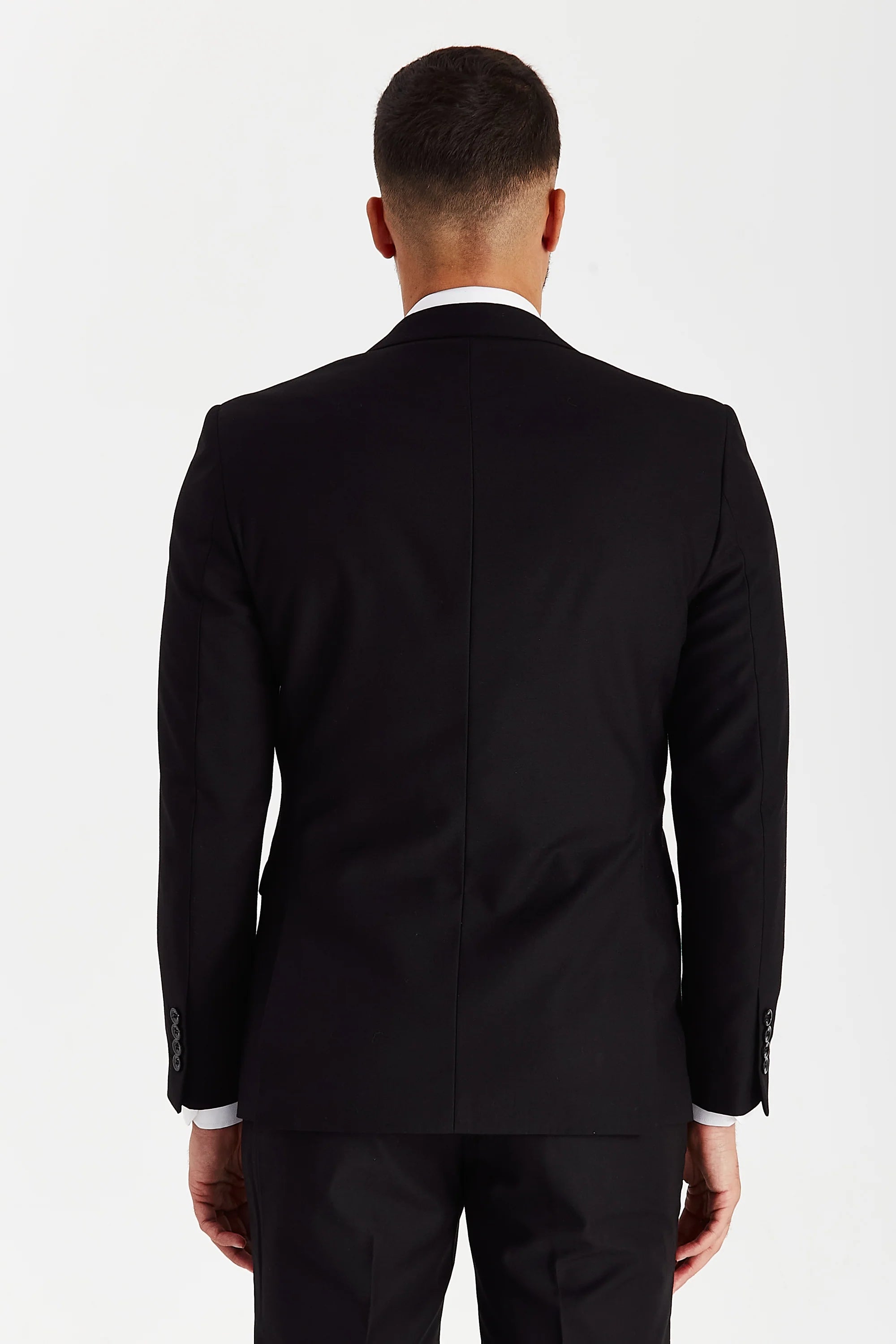 Rear view of the Parker Men's Black Blazer, displaying the garment's clean lines, tailored fit, and classic vent-less design.