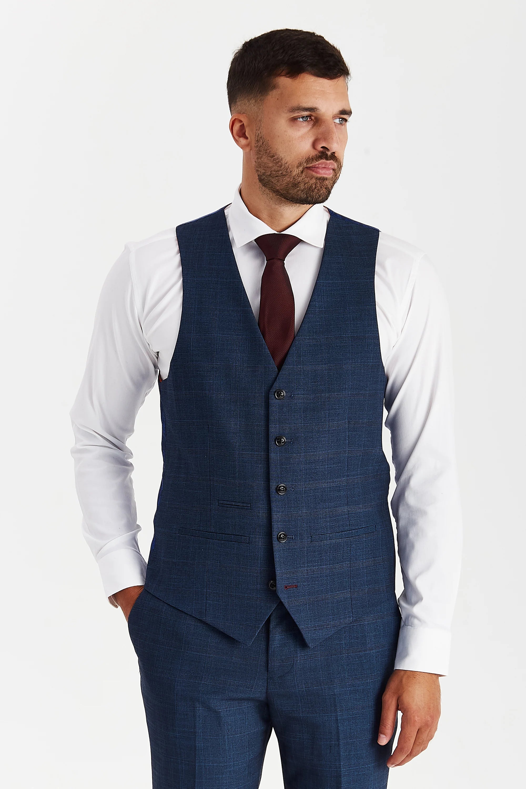 Front view of the navy glen check waistcoat, worn with matching trousers, a white shirt and a burgundy tie.